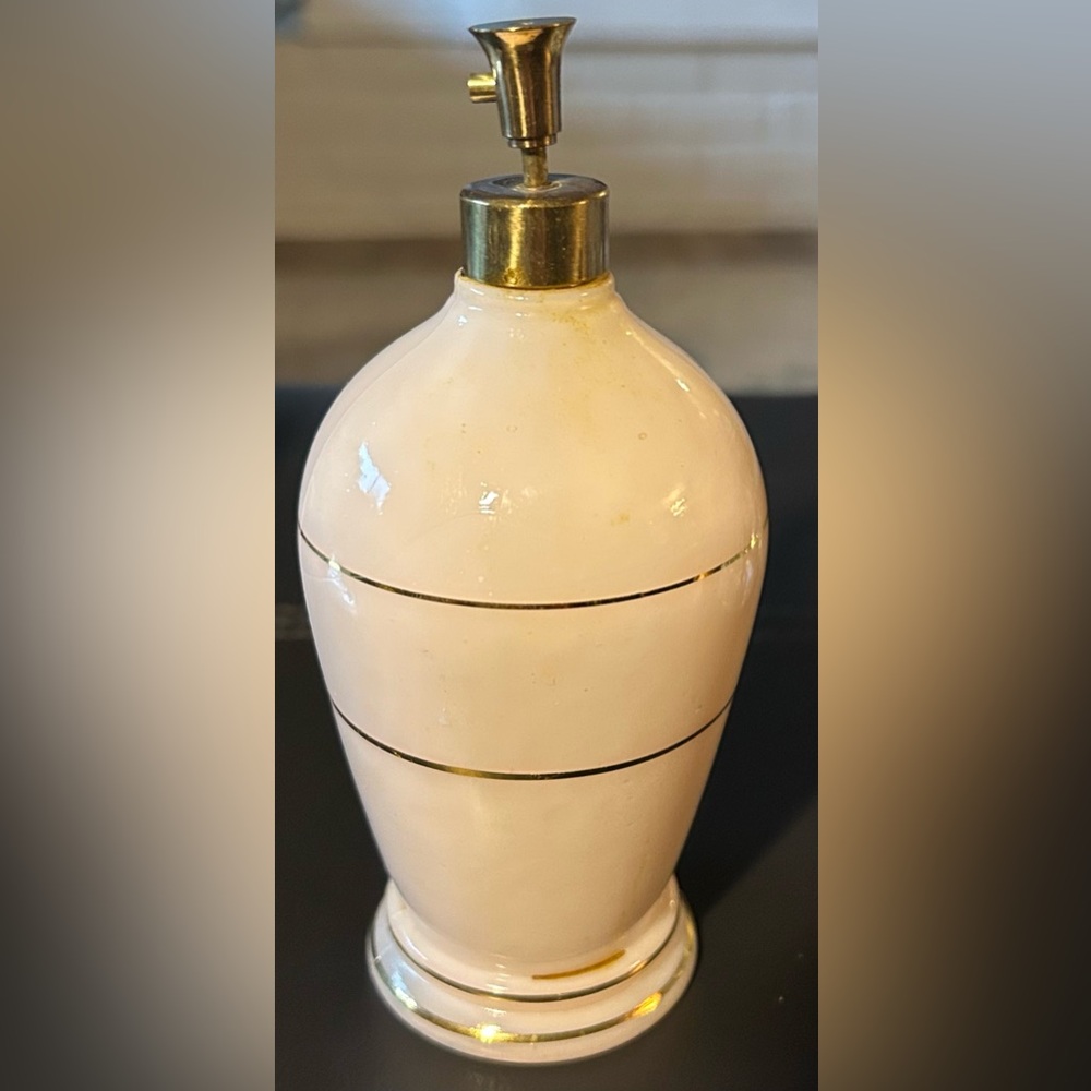 Vintage cream ceramic perfume bottle with gold accents. Irice France import